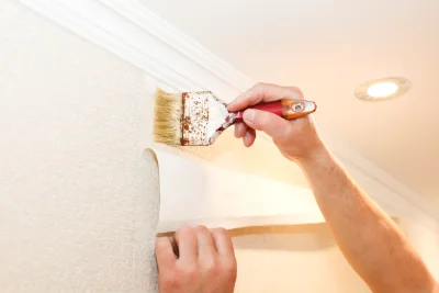 Pose de papier peint à Goas — revêtements muraux et toiles de verre